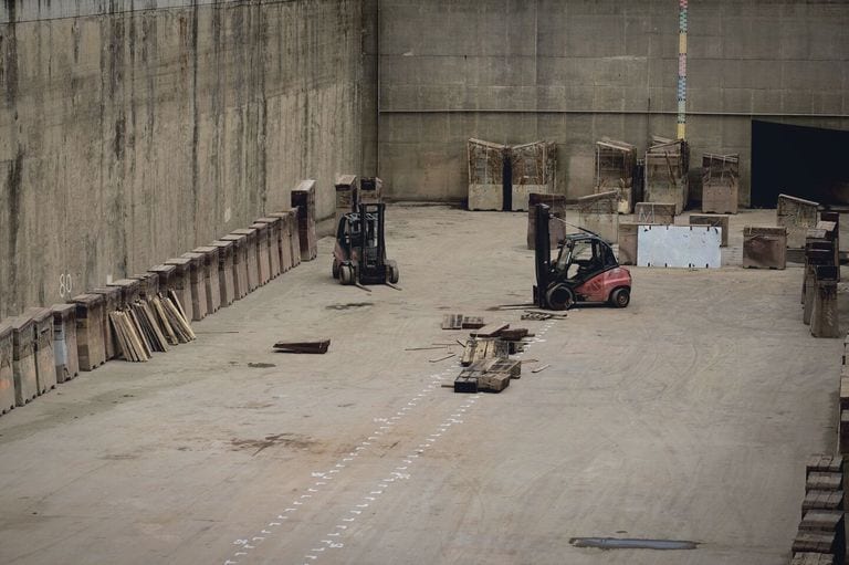 Forklifts working a manufacturing dock