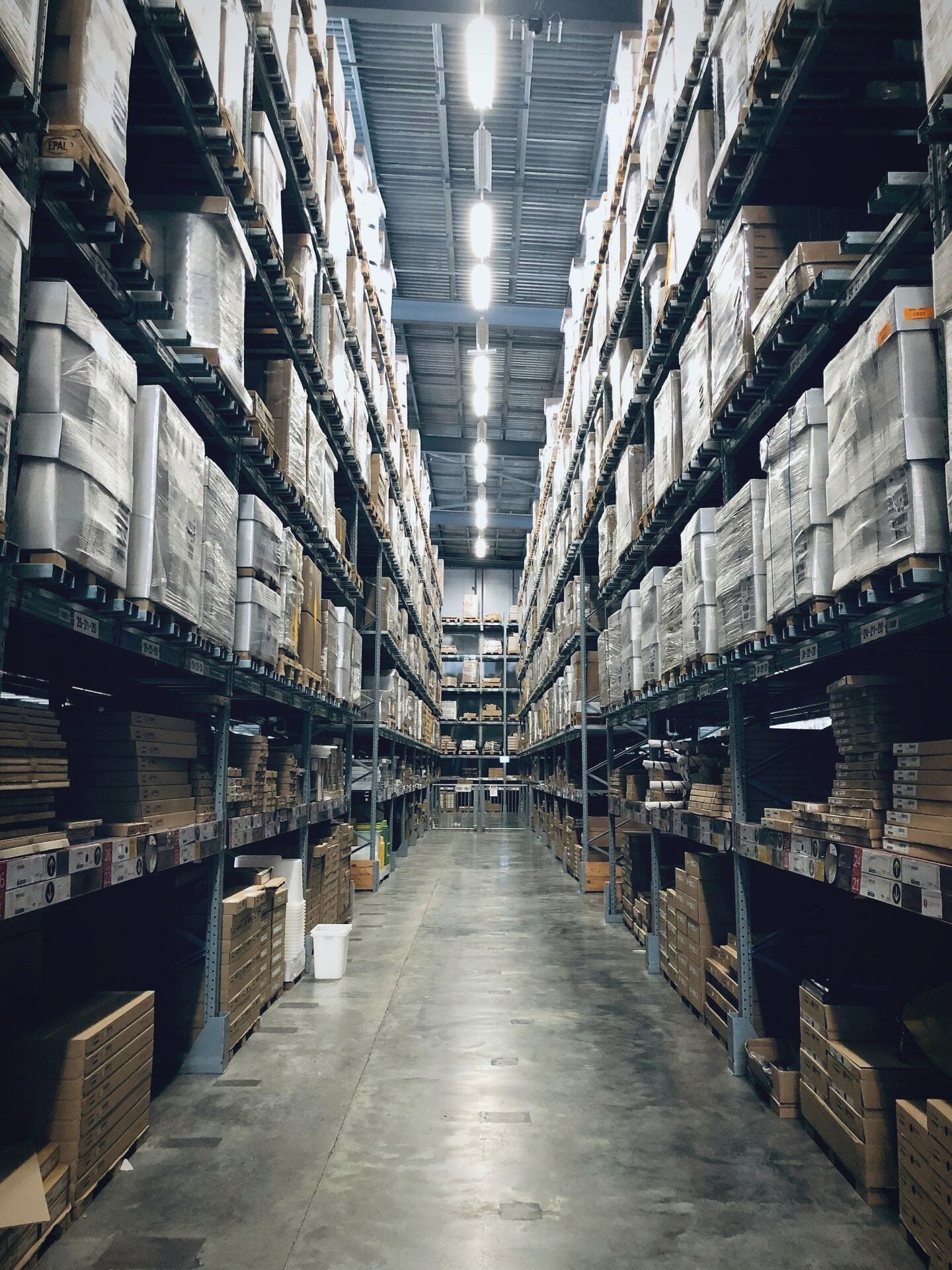 High-bay racking holding stored pallets